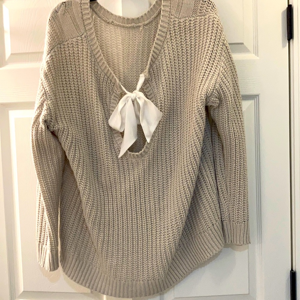 Back-tie cream sweater